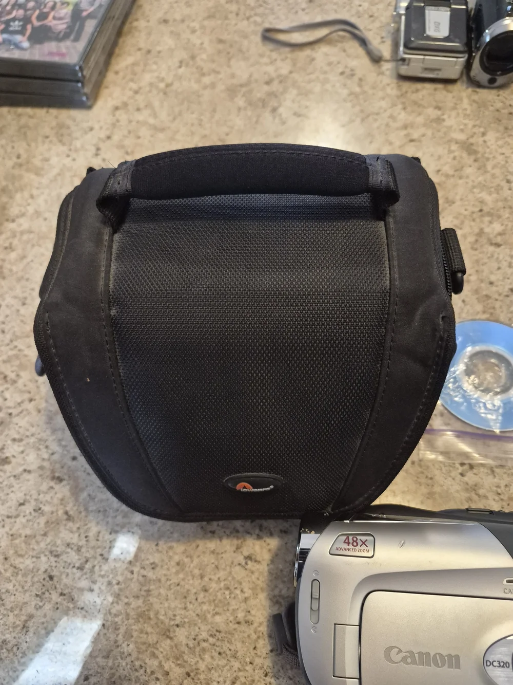 Canon Model # DC-320 Silver DVD Camcorder with Accessories